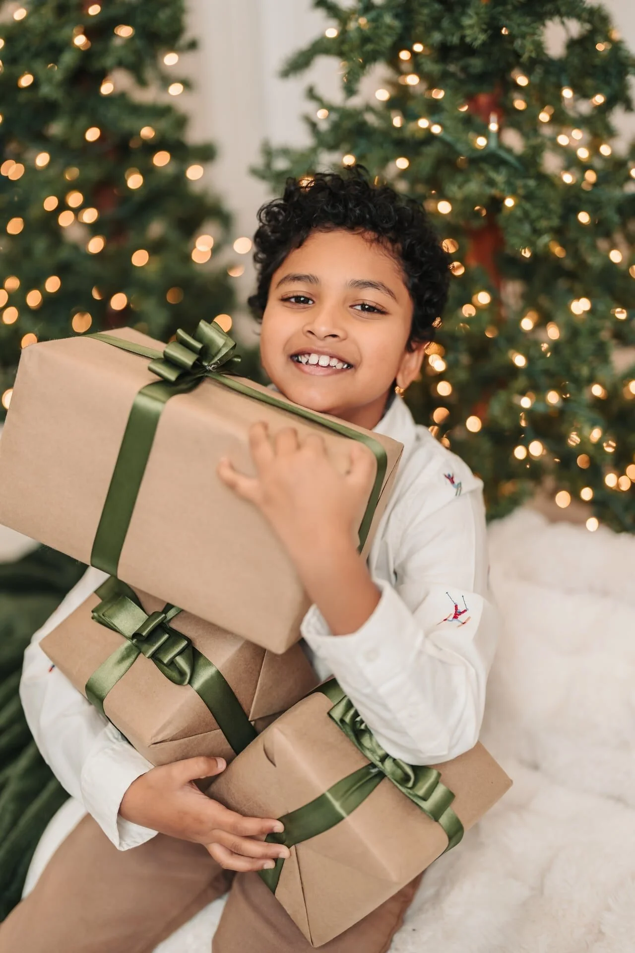 boy-hugging-gifts-christmas-mini-toronto.jpg