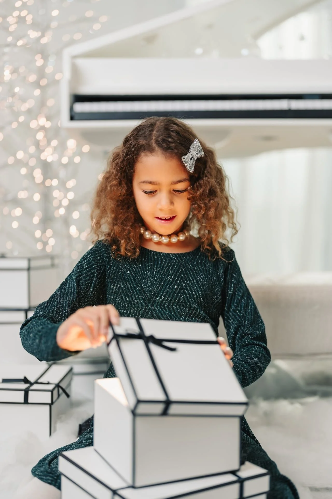 child-opening-gifts-christmas-mini-toronto.jpg