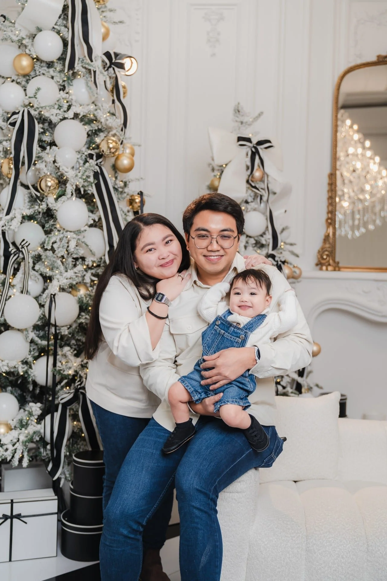 Family and baby at a first Christmas mini session in a Toronto studio