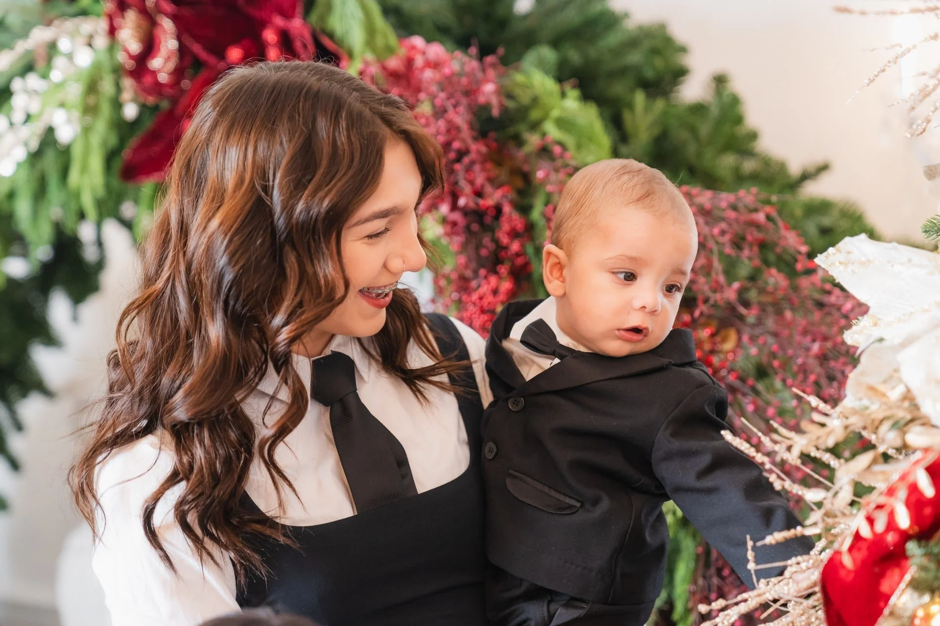 Elder Sister and baby at a first Christmas mini session in Toronto