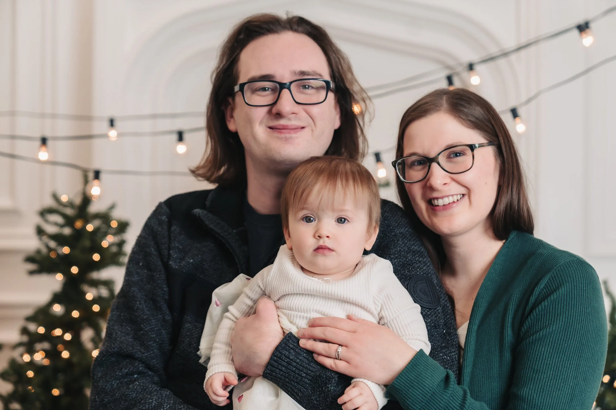 Family with their baby at a Christmas mini session in Toronto