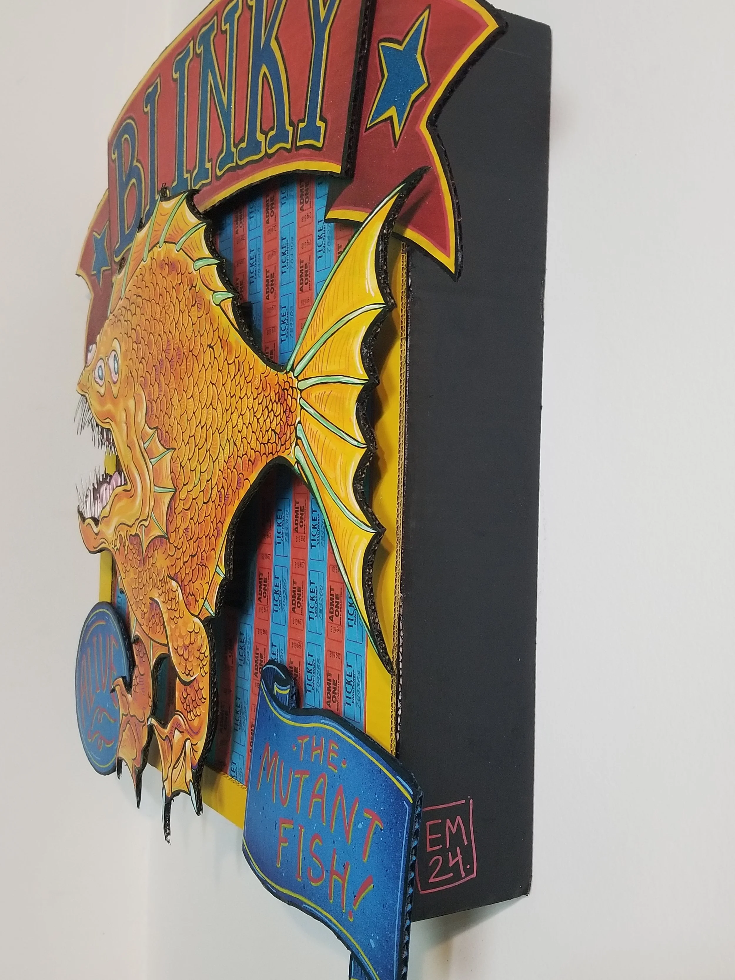 “Blinky”
Cardboard, acrylic, amusement park tickets, glitter
27” x 24”
$400
(Details)
Email oddmoddworks@gmail.com for Shipping Inquiries
