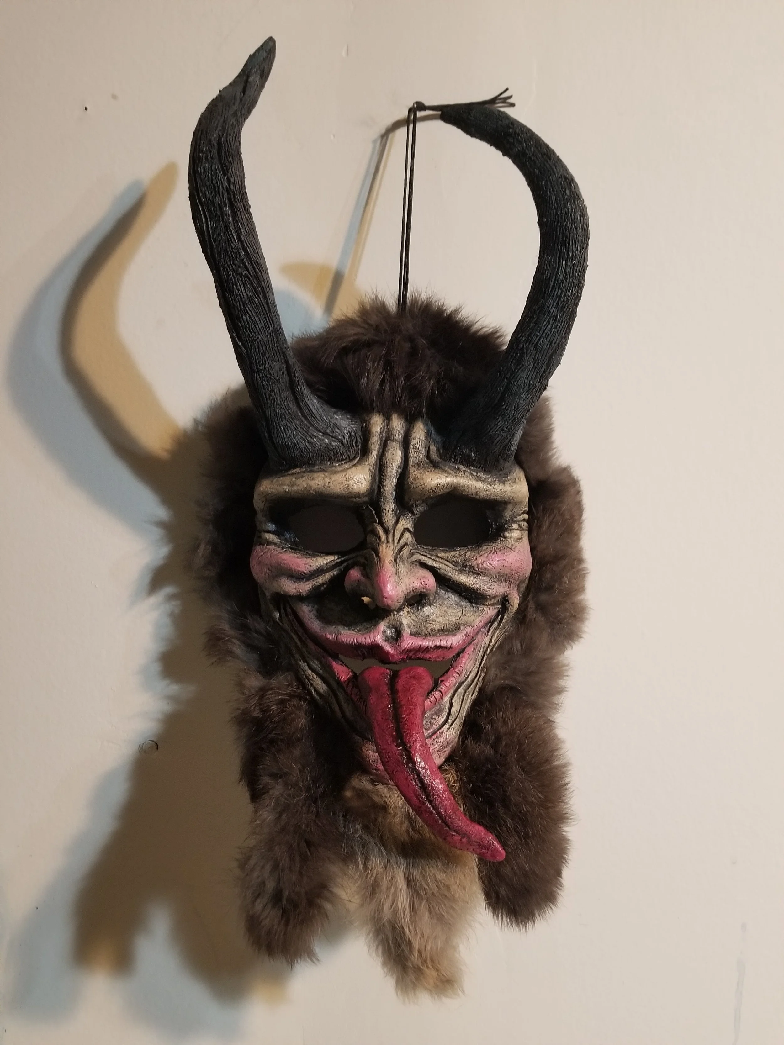 Krampus Mask
Stone clay, acrylic, rabbit pelt
18” x 9”
$150
Email oddmoddworks@gmail.com for Shipping Inquiries
