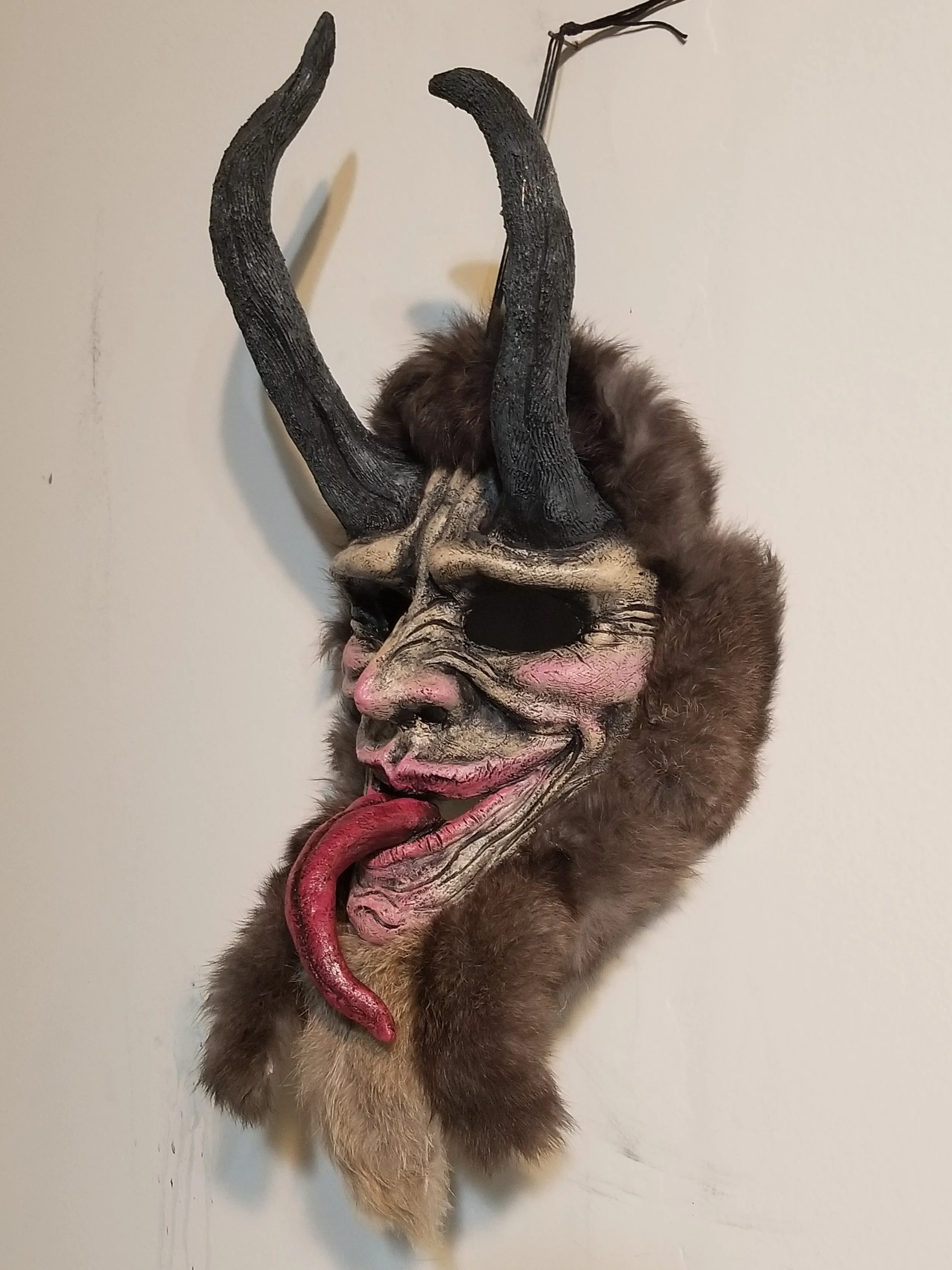Krampus Mask
Stone clay, acrylic, rabbit pelt
18” x 9”
$150
(Details)
Email oddmoddworks@gmail.com for Shipping Inquiries
