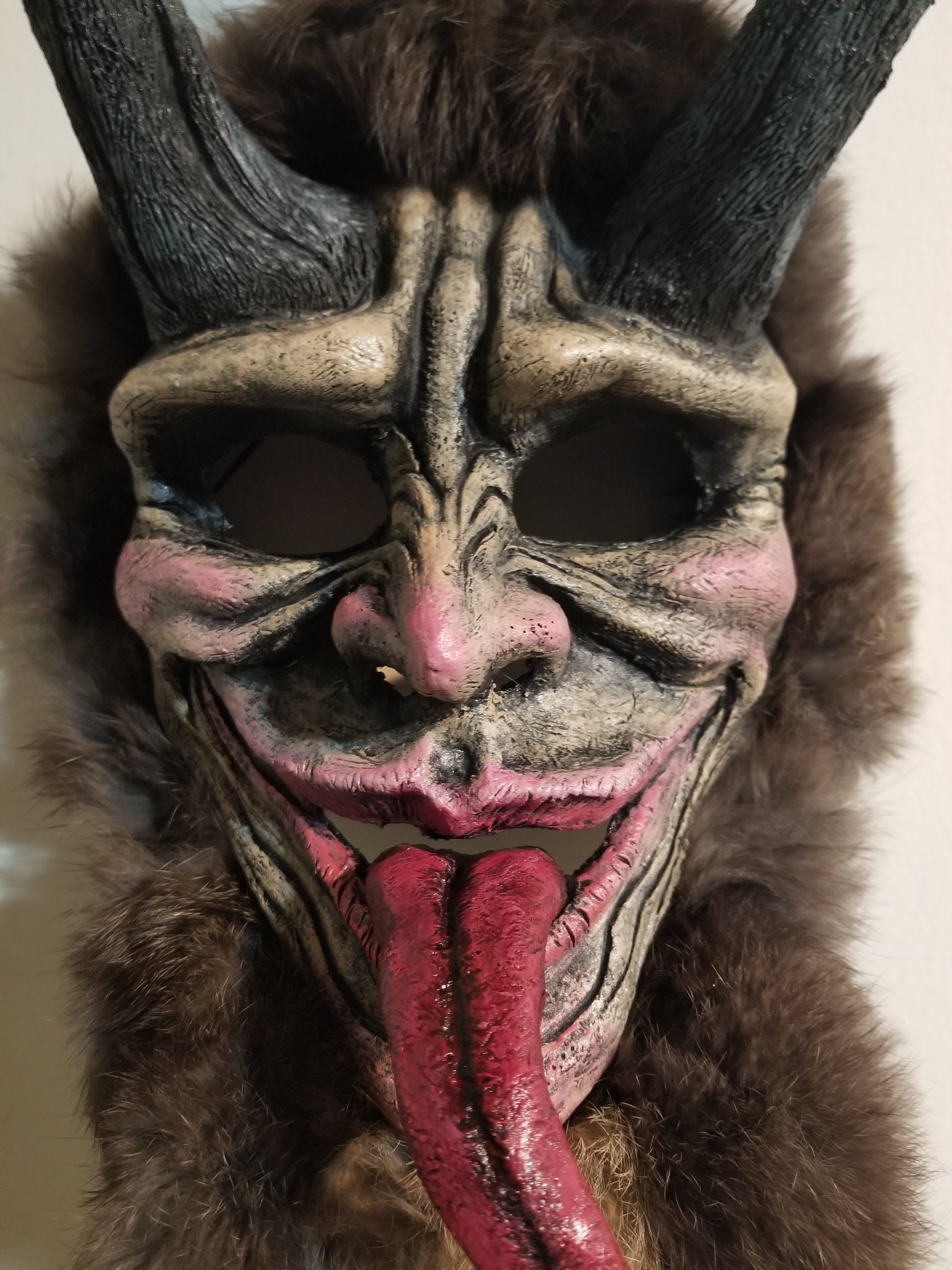 Krampus Mask
Stone clay, acrylic, rabbit pelt
18” x 9”
$150
(Details)
Email oddmoddworks@gmail.com for Shipping Inquiries
