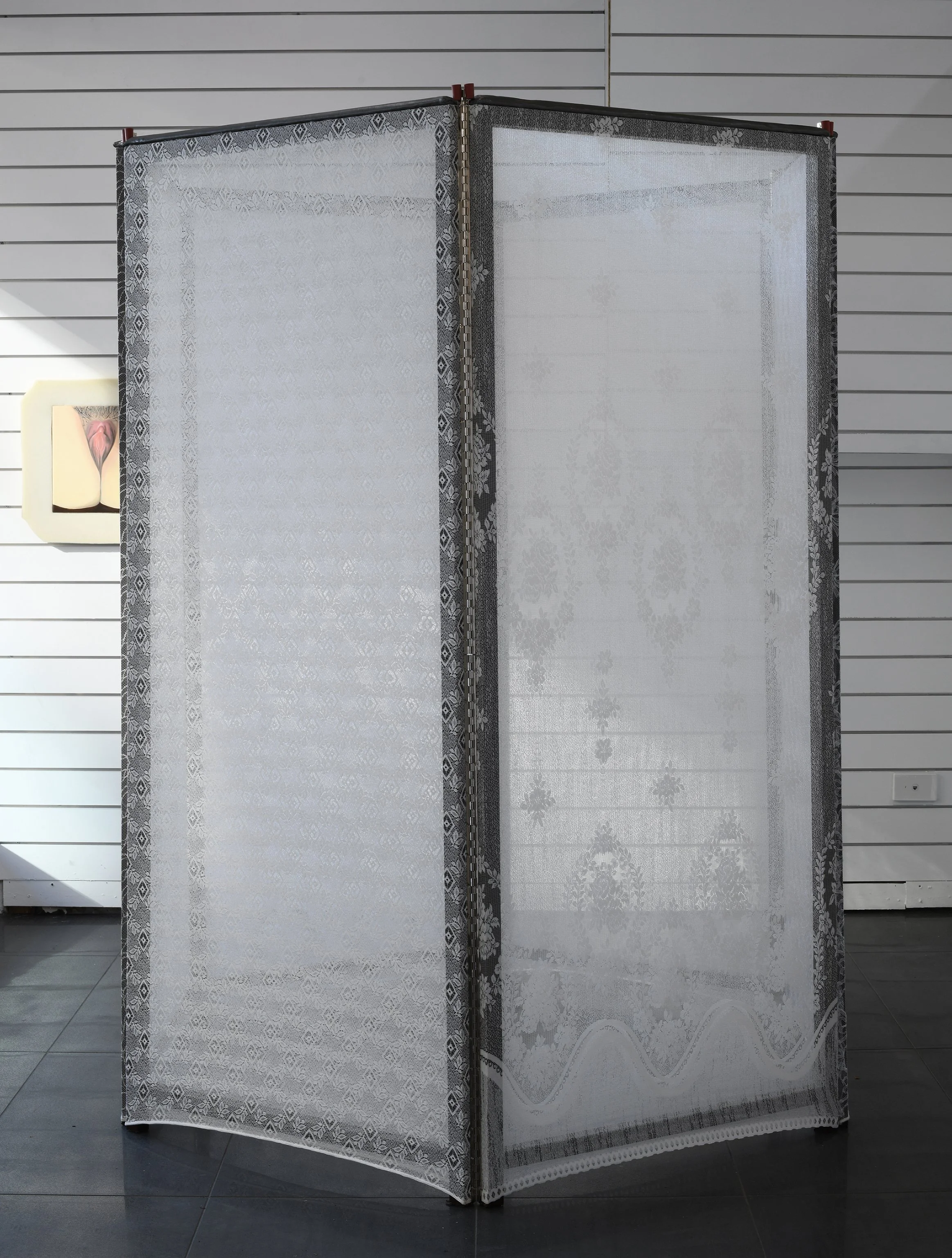 Modelled after a padded cell, 2023							
Pine, mission brown house paint, lace curtains, steel hinges, lead sheeting, 
rubber and my parents old glass ashtray
160x140x184cm
