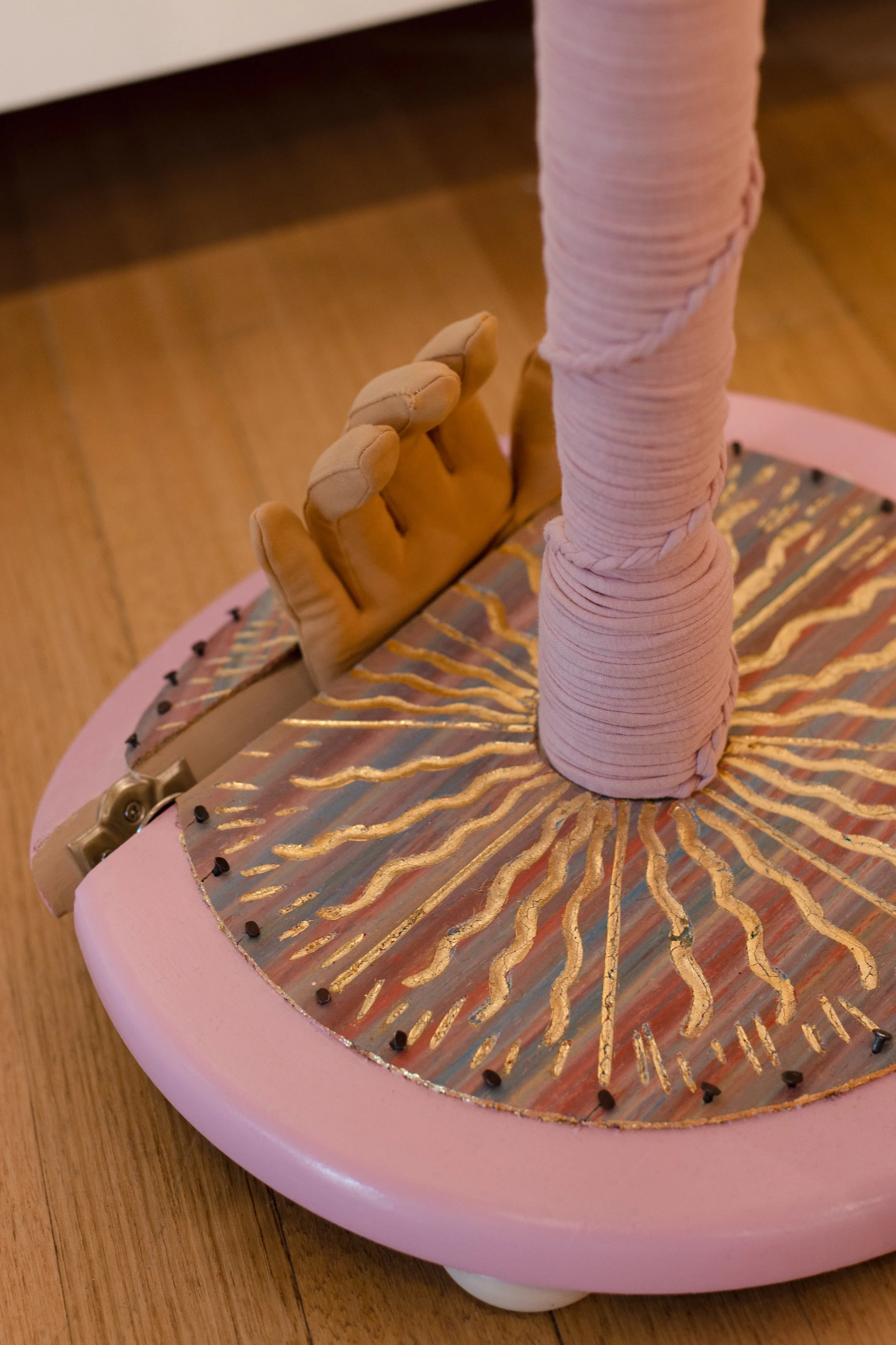 A Little to The Left, 2022	
Found furniture, enamel paint, linoleum, gold leaf, resin, nylon rope, nylon pantyhose, foam, found glove, steel nails	
60 x 140 x 35cm
