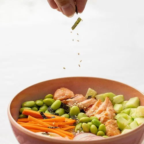 low FODMAP miso salmon poke bowl with sprinkle of seaweed and sesame seeds.jpg