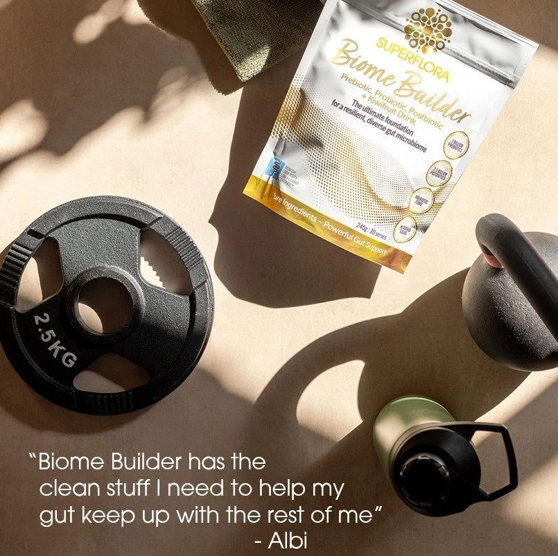 Pack of  Biome Builder and weights, and water bottle next to a review.