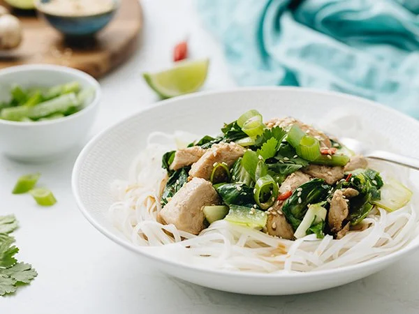 Asian Greens Stir-fry with chicken and rice noodles