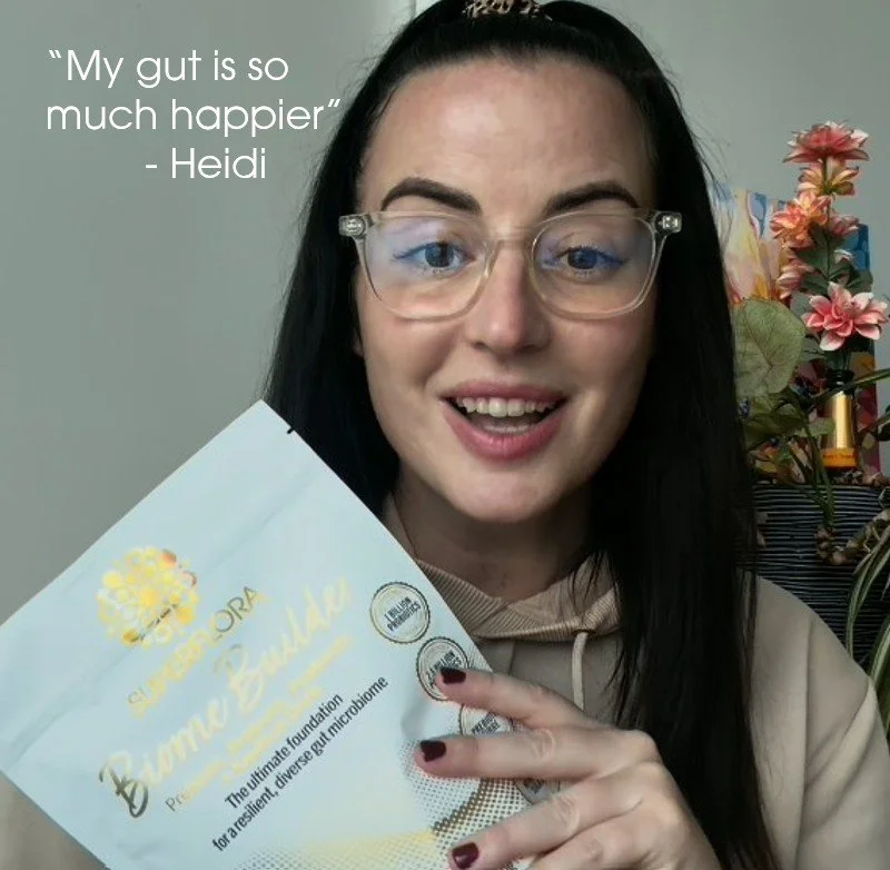 Heidi holding a pack of Biome Builder with her review saying her gut is much happer.