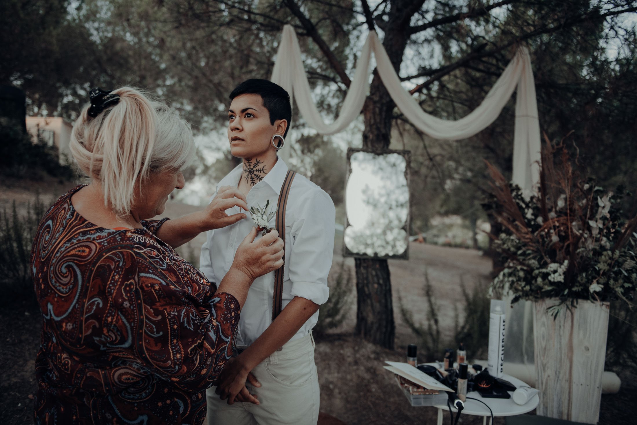  Bride 1 having her buttonhole pinned on 