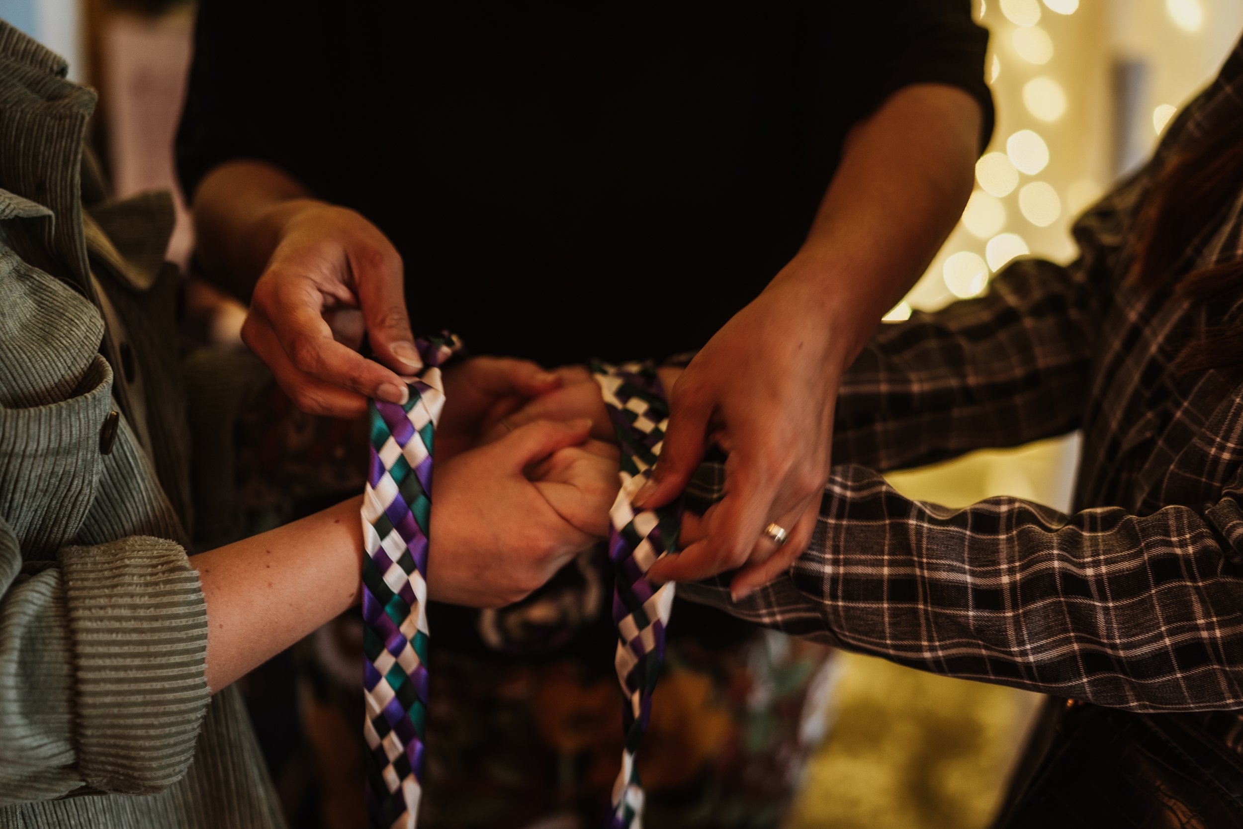  A close up of a handfasting ceremony demo at The Un-Wedding Show. 