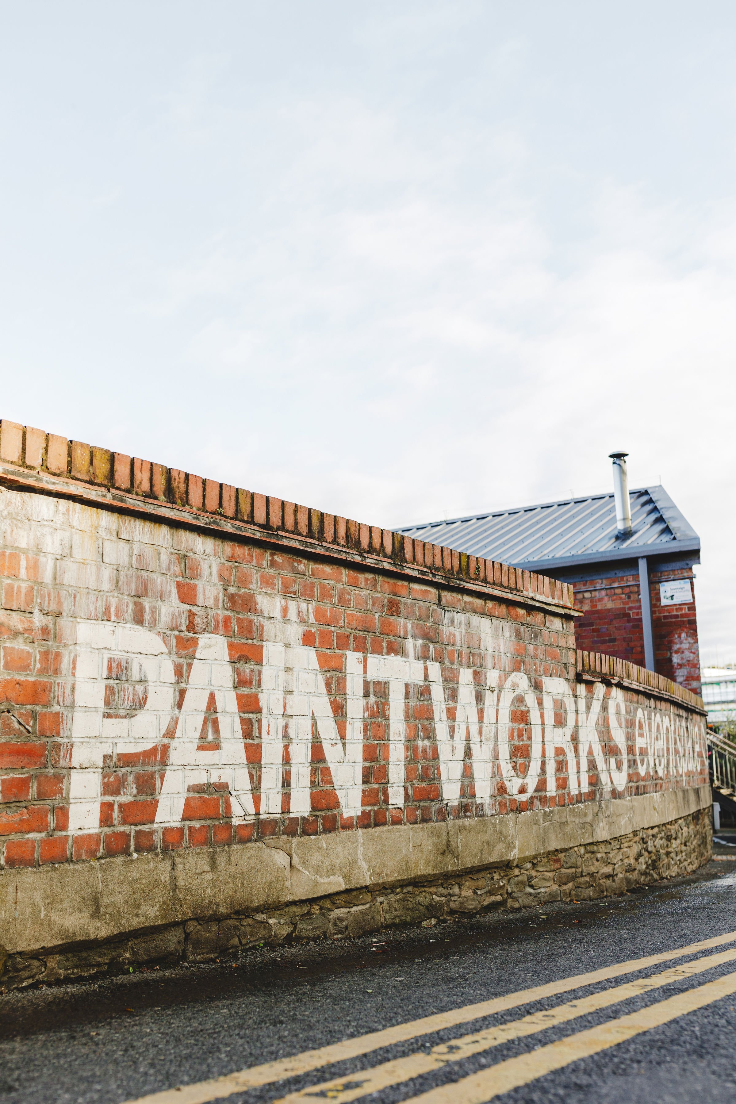  Wedding venue in Bristol painted on exposed brick wall. 