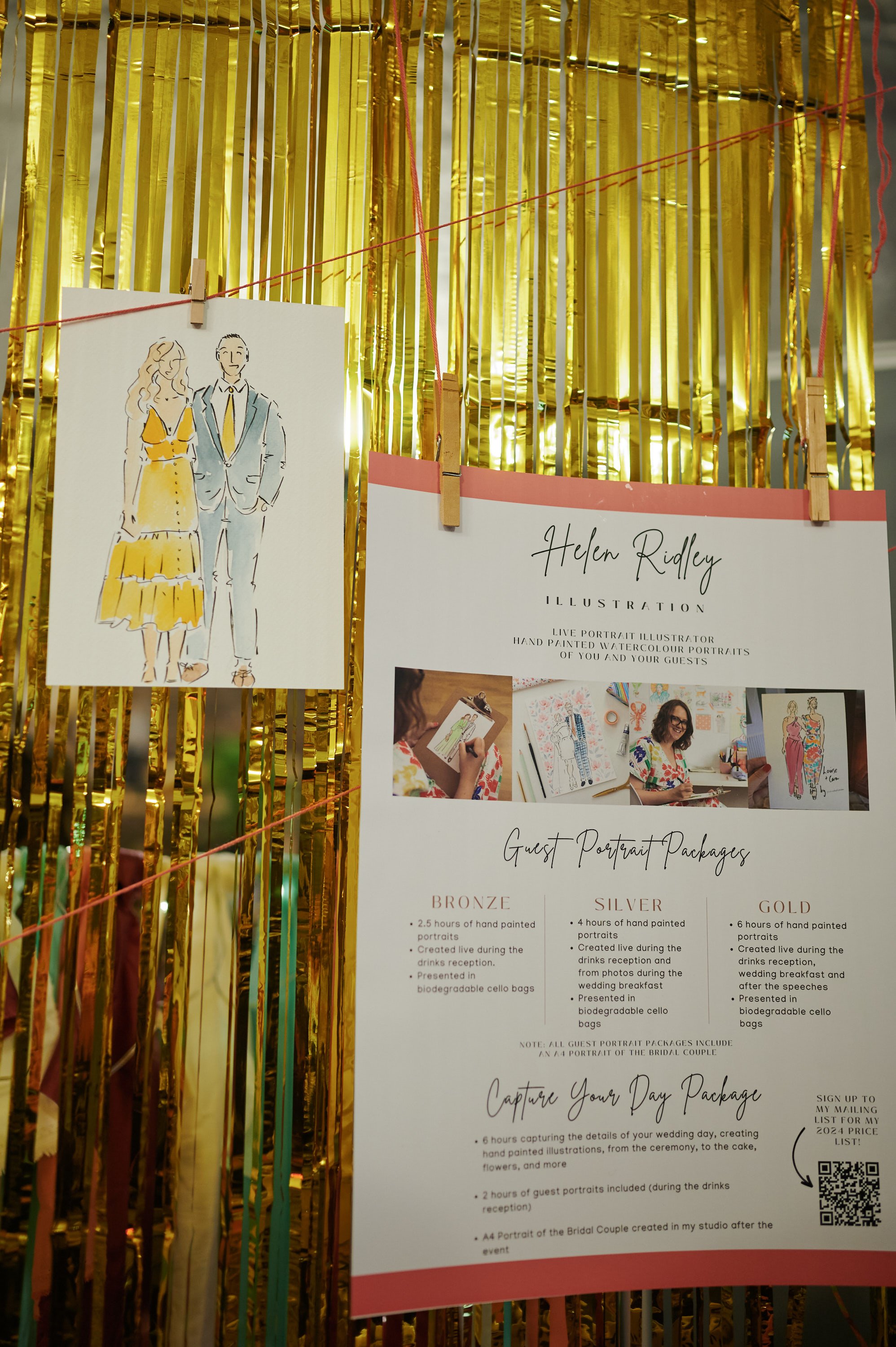  A gold foil curtain with an illustration of a happy couple hanging on it. 