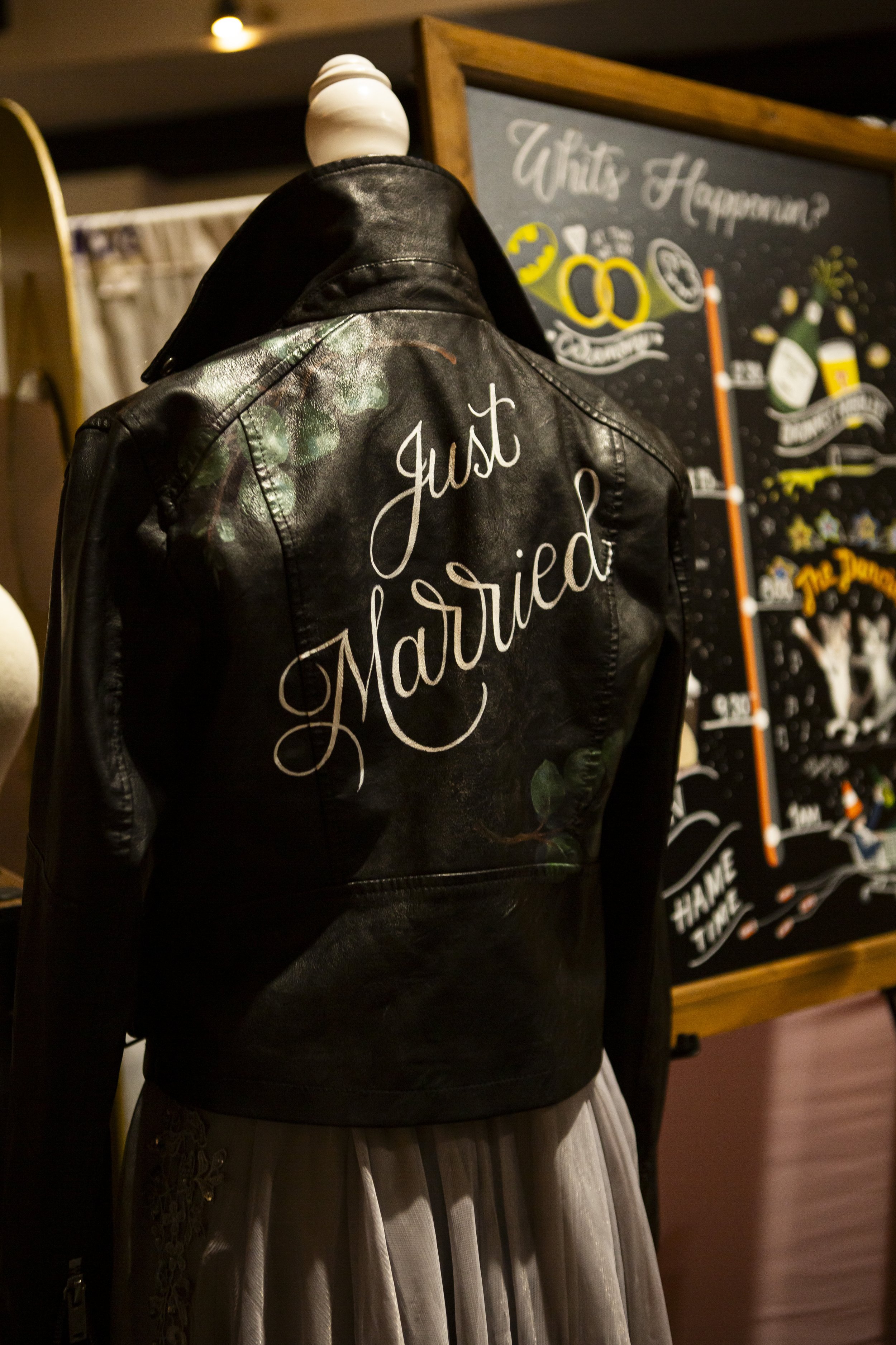  TOASTY TYPE’s hand painted JUST MARRIED black leather jacket. 