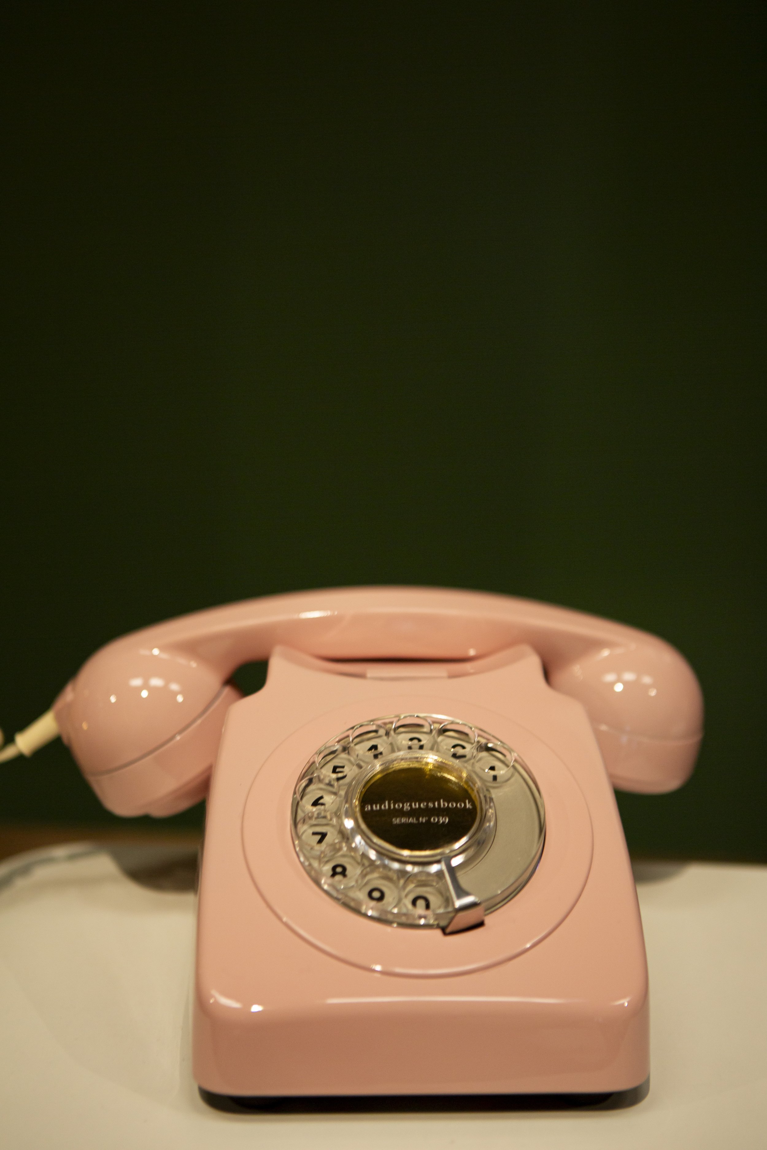  Retro pale pink telephone with audioguestbook monogram in the middle. 