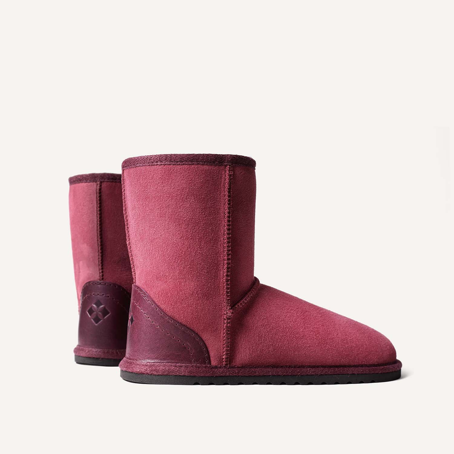 A pair of pink sheepskin boots.
