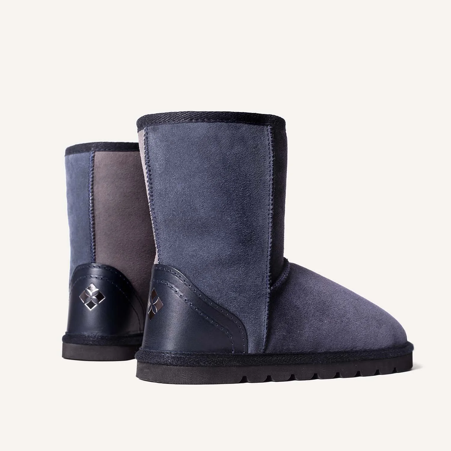 Pair of blue grey sheepskin boots.