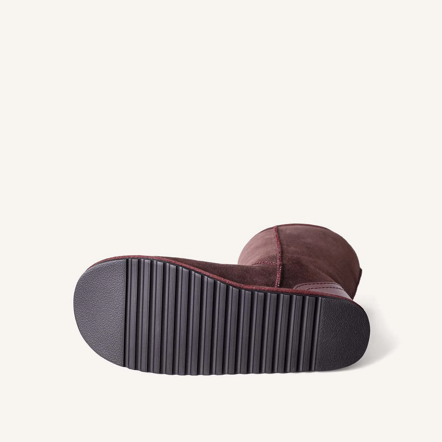 Strong, durable sole of sheepskin slipper boot.