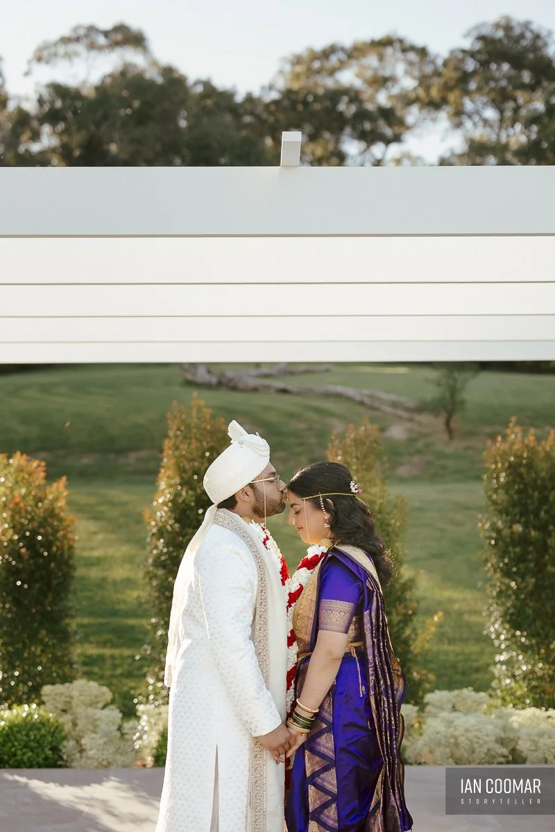 bramleigh-estate-wedding-photography-groom-bride-kiss-portraits.jpg