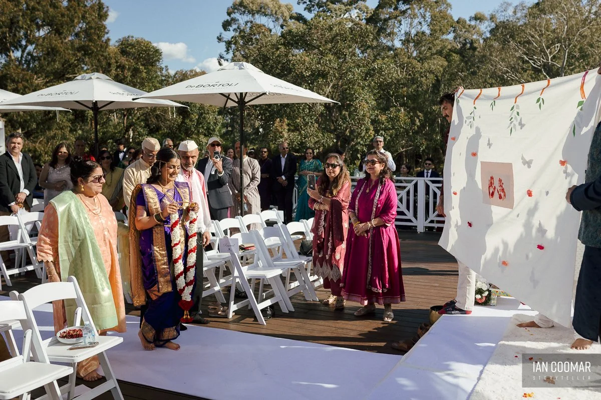 bramleigh-estate-wedding-photography-hindu-ceremony-bride-entrance.jpg