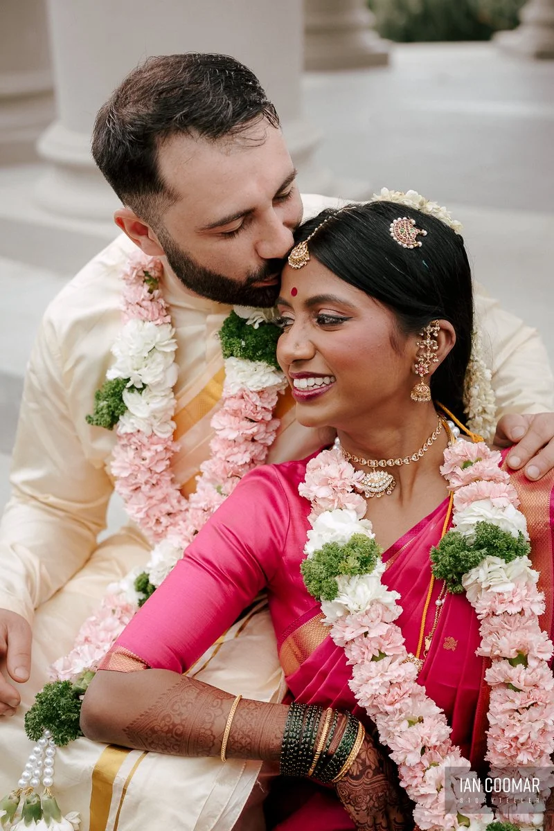 glasshaus-brucke-hindu-wedding-richmond-groom-kiss-bride.jpg