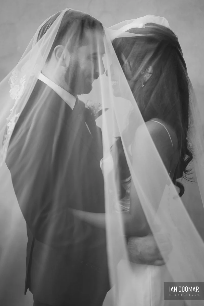 sheldon-reception-wedding-veil-over-couple-fitzroy-town-hall.jpg