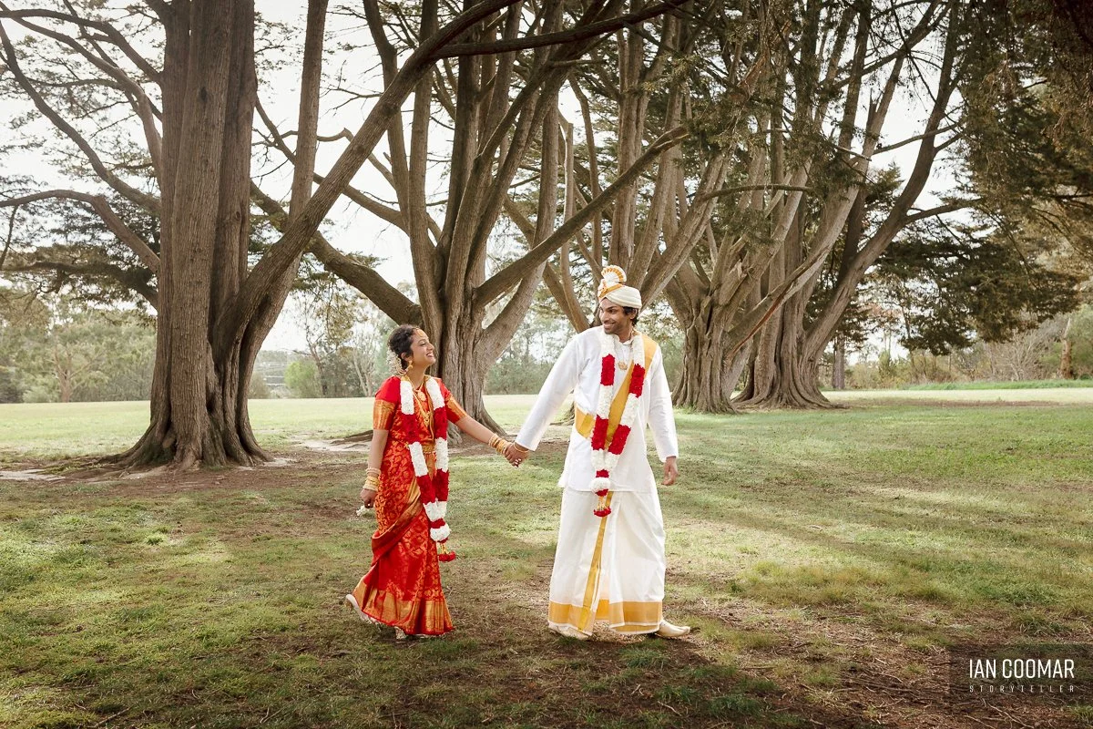 cathies-lane-receptions-wedding-couple-walking-candid.jpg