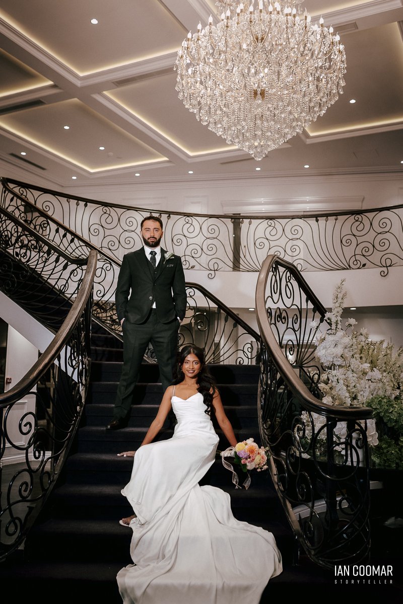 sheldon-reception-wedding-couple-staircase.jpg