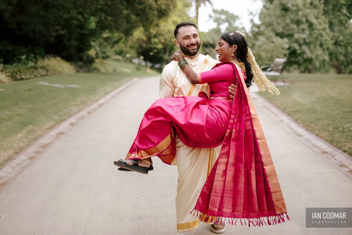 glasshaus-brucke-hindu-wedding-richmond-groom-carry-bride.jpg