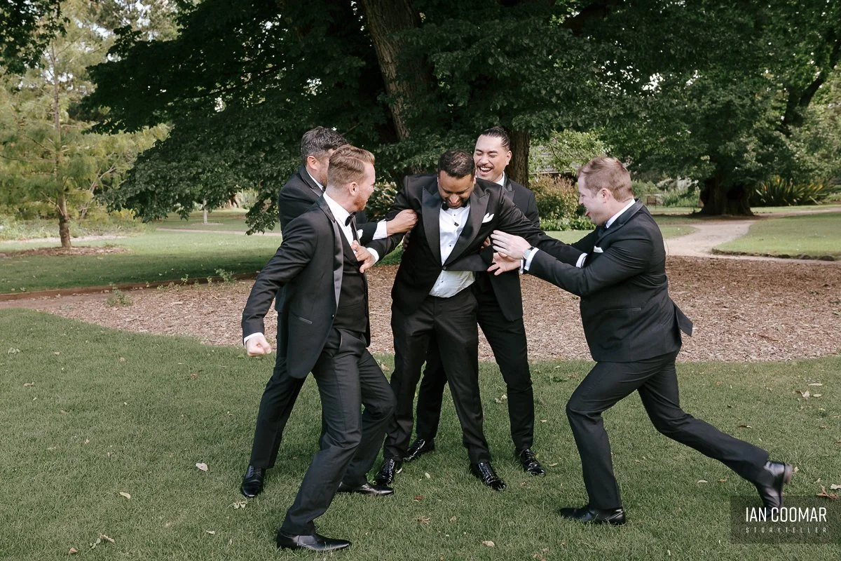 rippon-lea-estate-wedding-groomsmen-candid.jpg