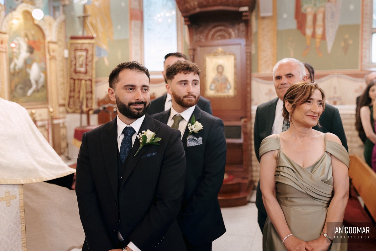 sheldon-reception-wedding-groom-reaction-church.jpg