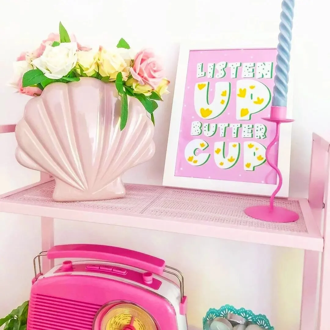 We're back! Sorry pals, it's been quite the time. But, we are really loving seeing our prints in your beautiful homes. Honestly, it makes our day. 
Check out our super cute Listen Up Butter Cup print in @eedies_house - how awesome does it look? π