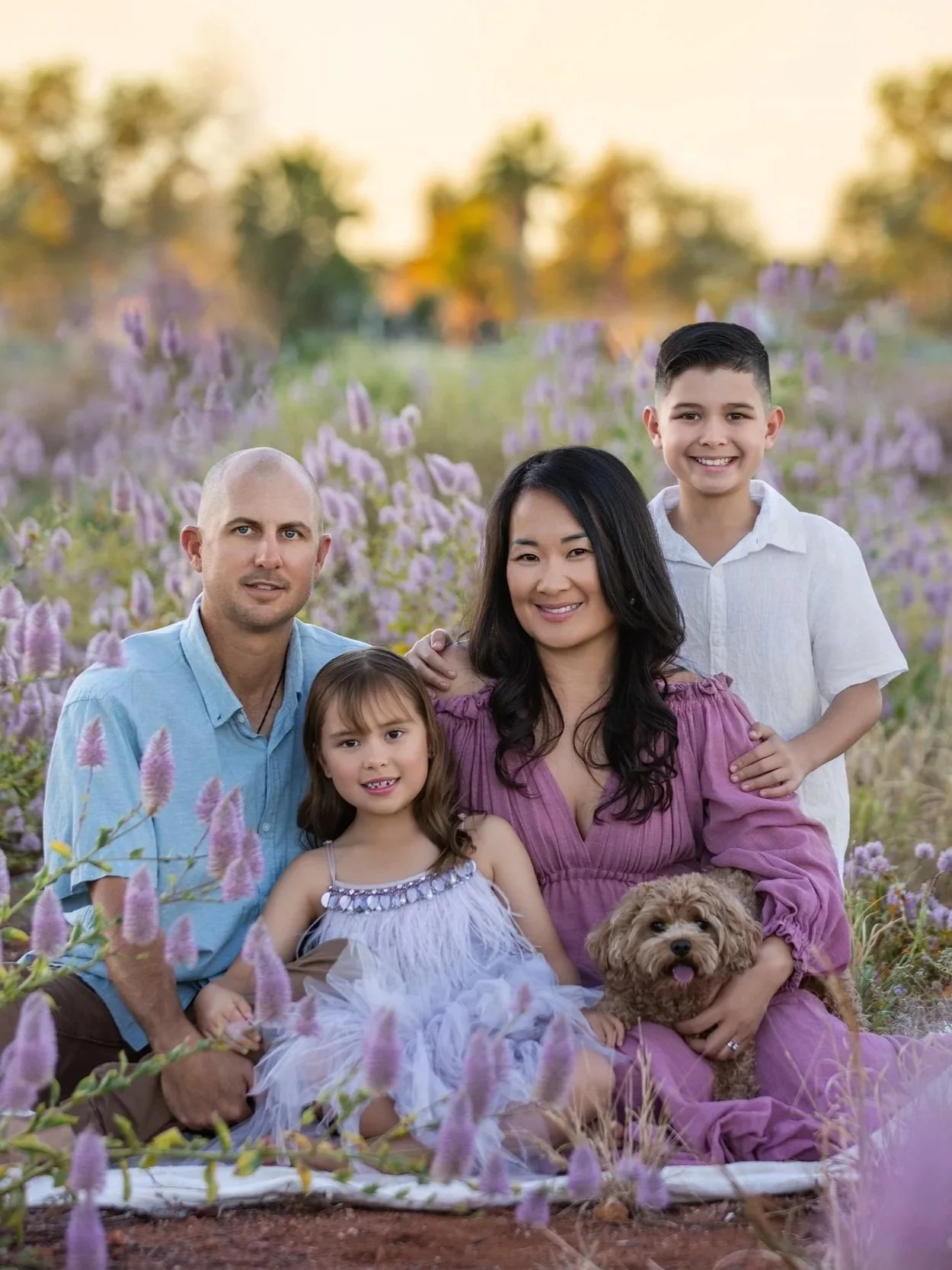 Outdoor family photoshoot in the purple mulla mulla wild flowers