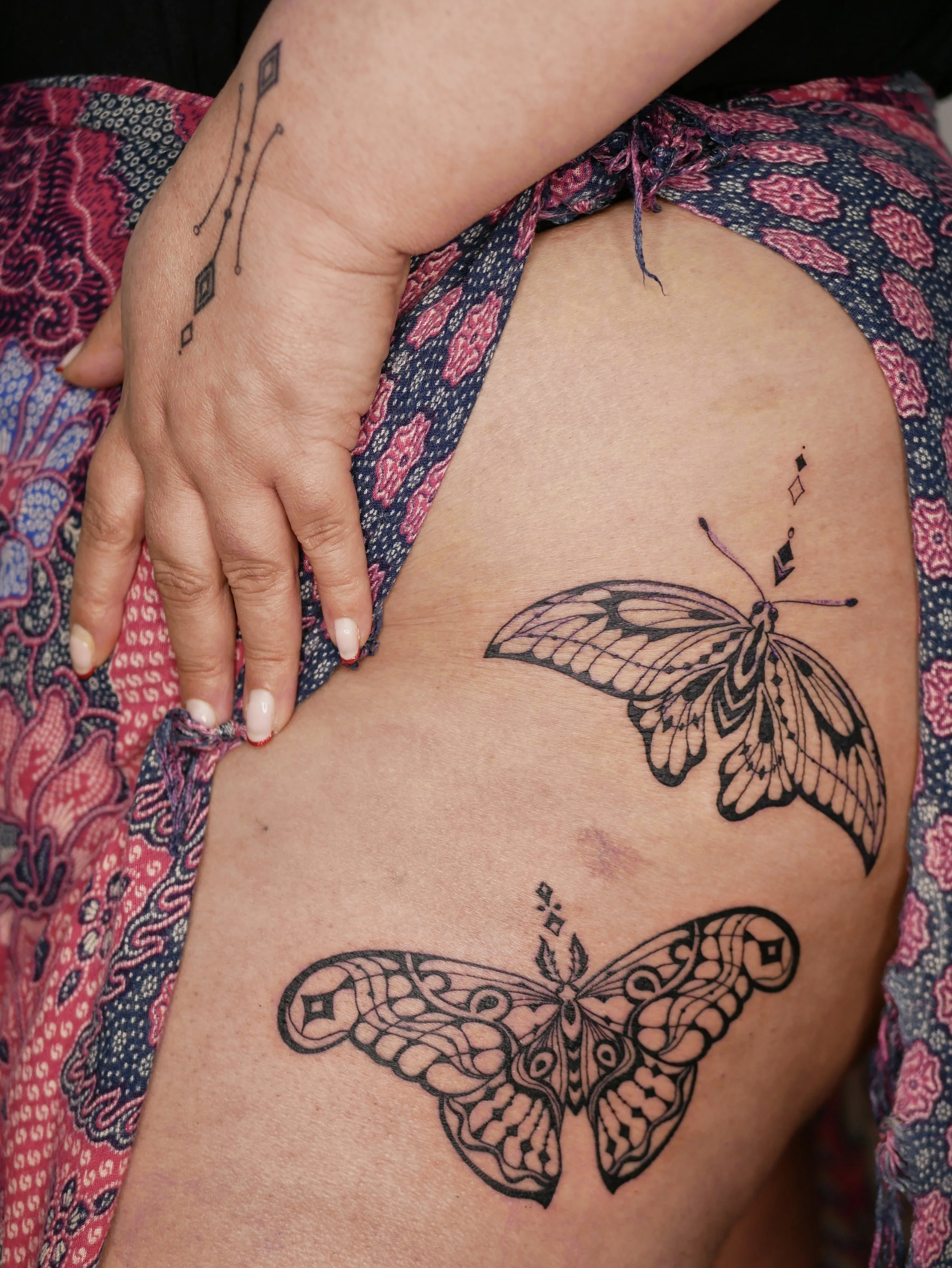 Moths on upper thigh
Bold and fineline tattoo 
2026