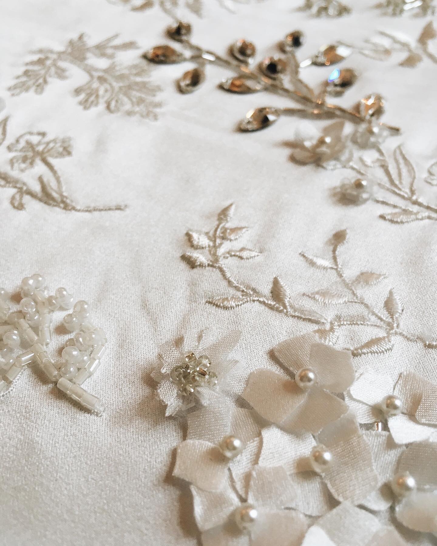 E M B E L L I S H M E N T

As part of my bespoke service, I can design and create embellishments for your veil. They are all crafted using couture techniques and add beautiful texture - silk petals, delicate pearls, subtle beads or statement sparkles