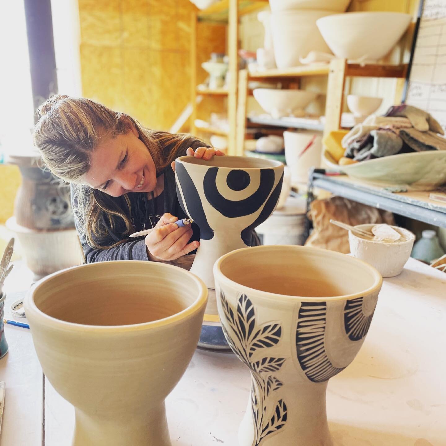 The sun is out and my friend stopped by to chat while I worked. She took several photos that would prove I make pretty awful faces while I work, but then we also laugh a lot. Finally unloaded a kiln just now!! It&rsquo;s been forever!! I&rsquo;ll be 