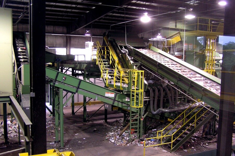  Recyclables continue along conveyors to spinning discs and shake tables for further separation - Ocean County Recycling Education Center, June 2010 
