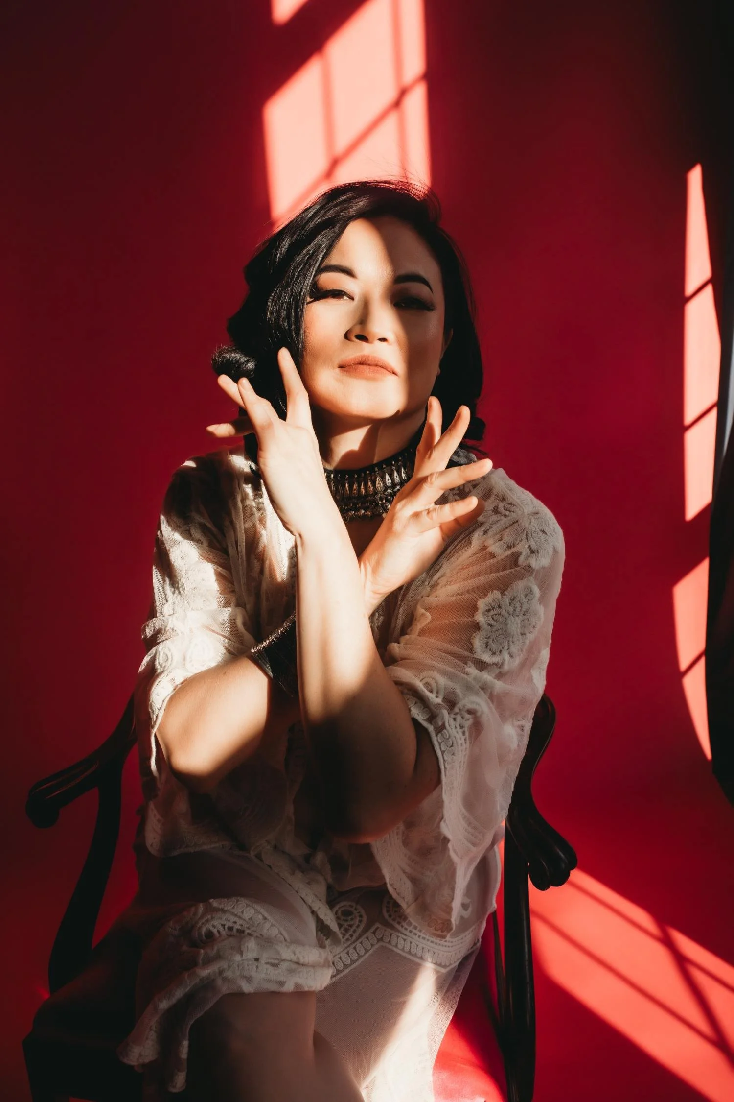 Ms S boudoir portrait in white sheer robe in Boston MA.