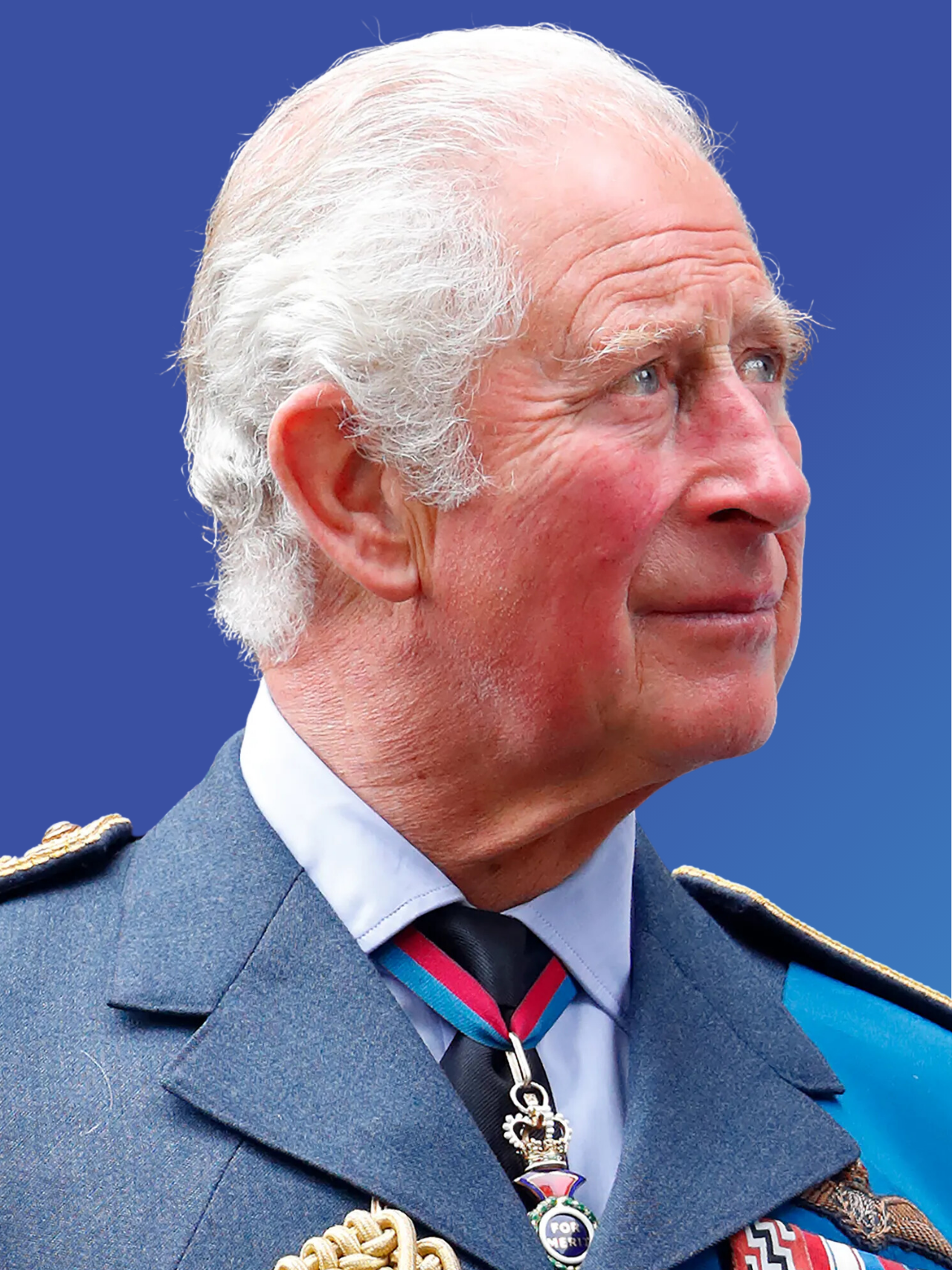 Close-up of an elderly man with white hair, dressed in a formal military uniform with medals and a colorful ribbon, looking to the right with a patriotic background.