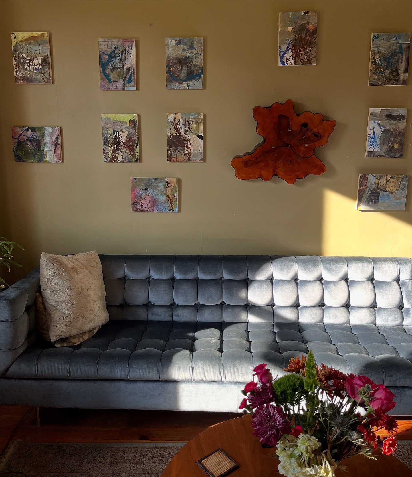 A view view of my living room with the installation of my small works project and a close up shot of four of them . If you want to see my entire collection, visit my website and checkout The Story in Roots and Rocks to see all of them. (Psst😉: if yo