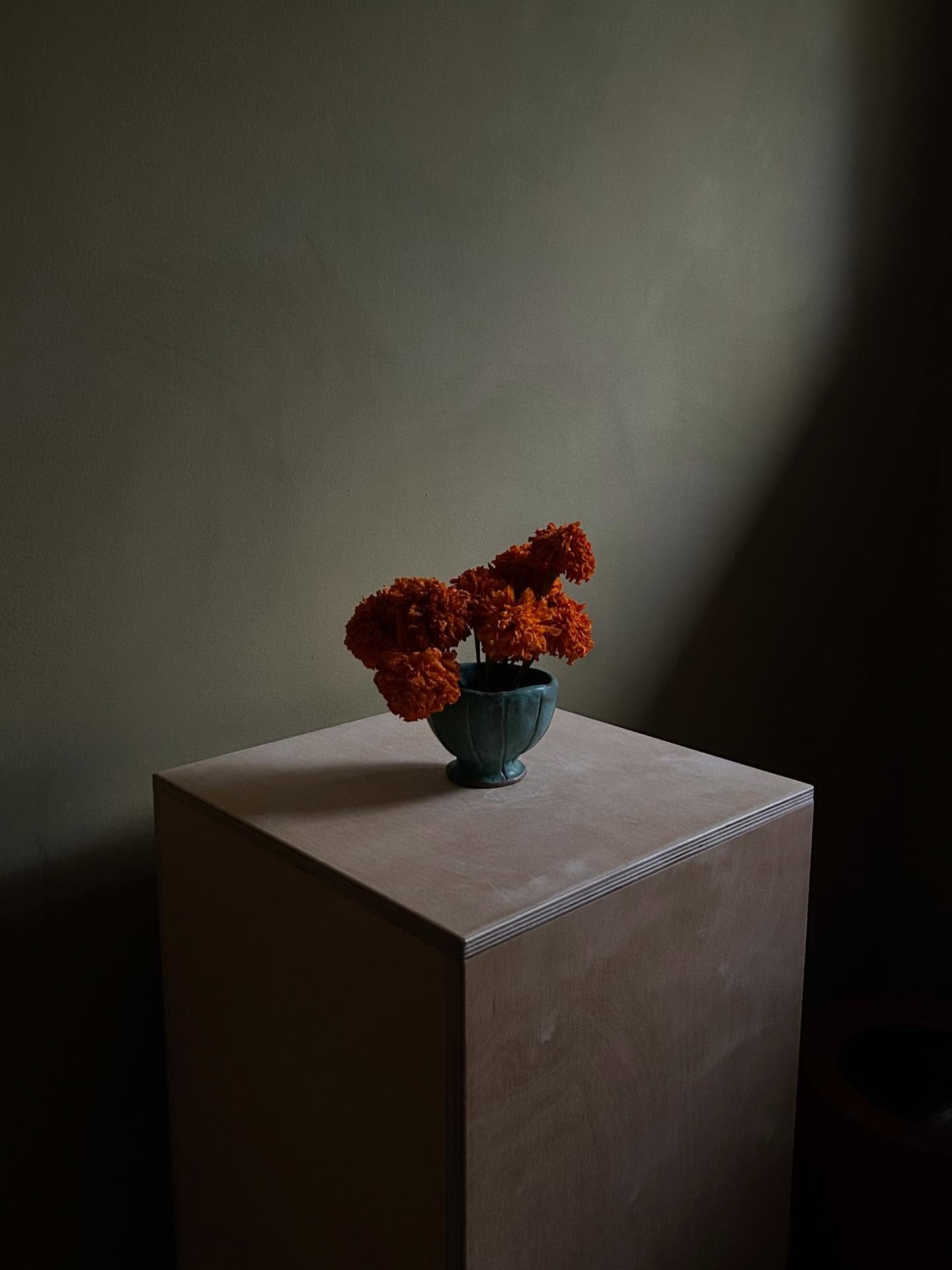 Copper Patina goblet holding aged marigolds 🧡