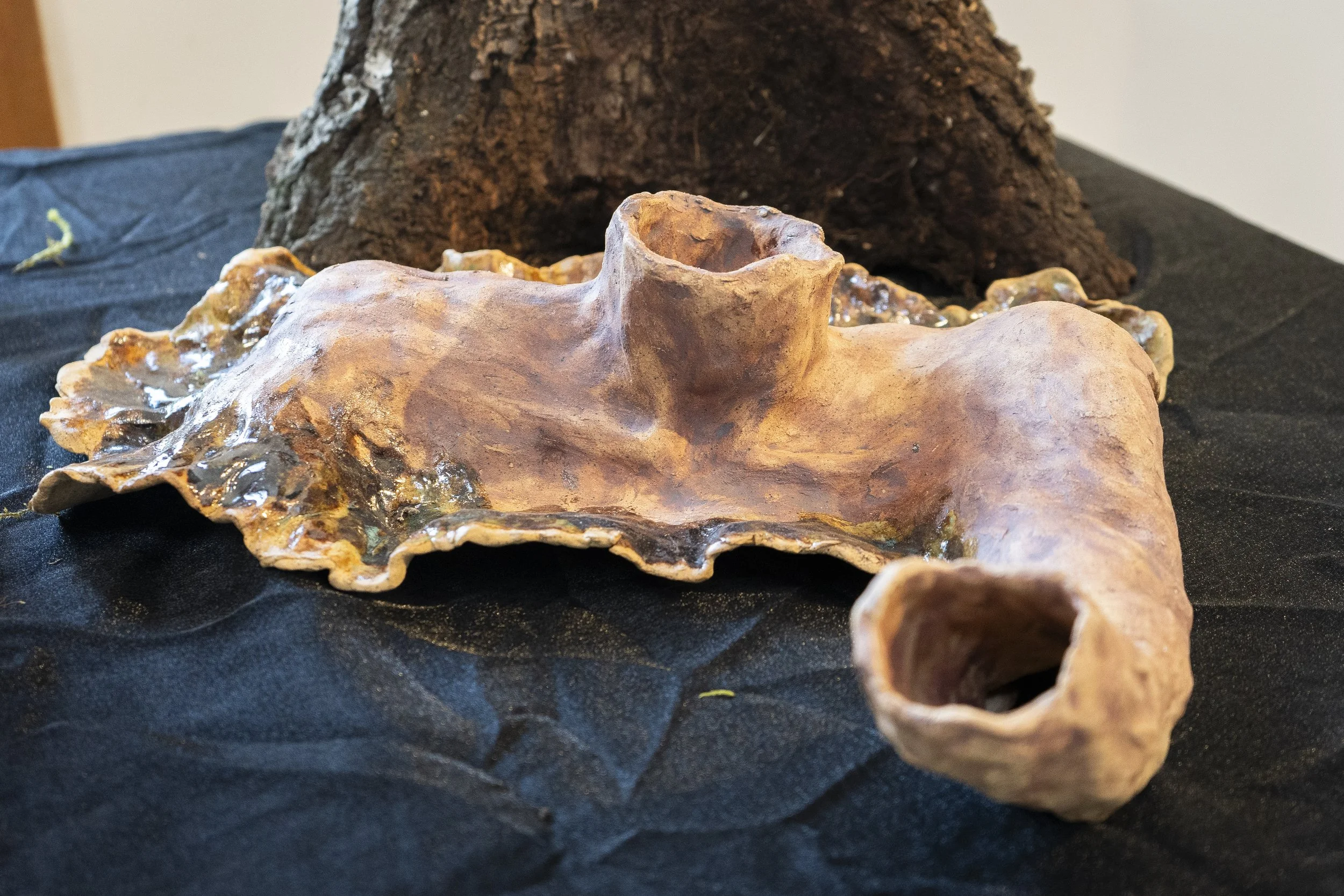 rising, 2025. Kira Joy Williams. Hand built glazed ceramic, red and black iron oxide, 13.5 x 9 x 14.5 in