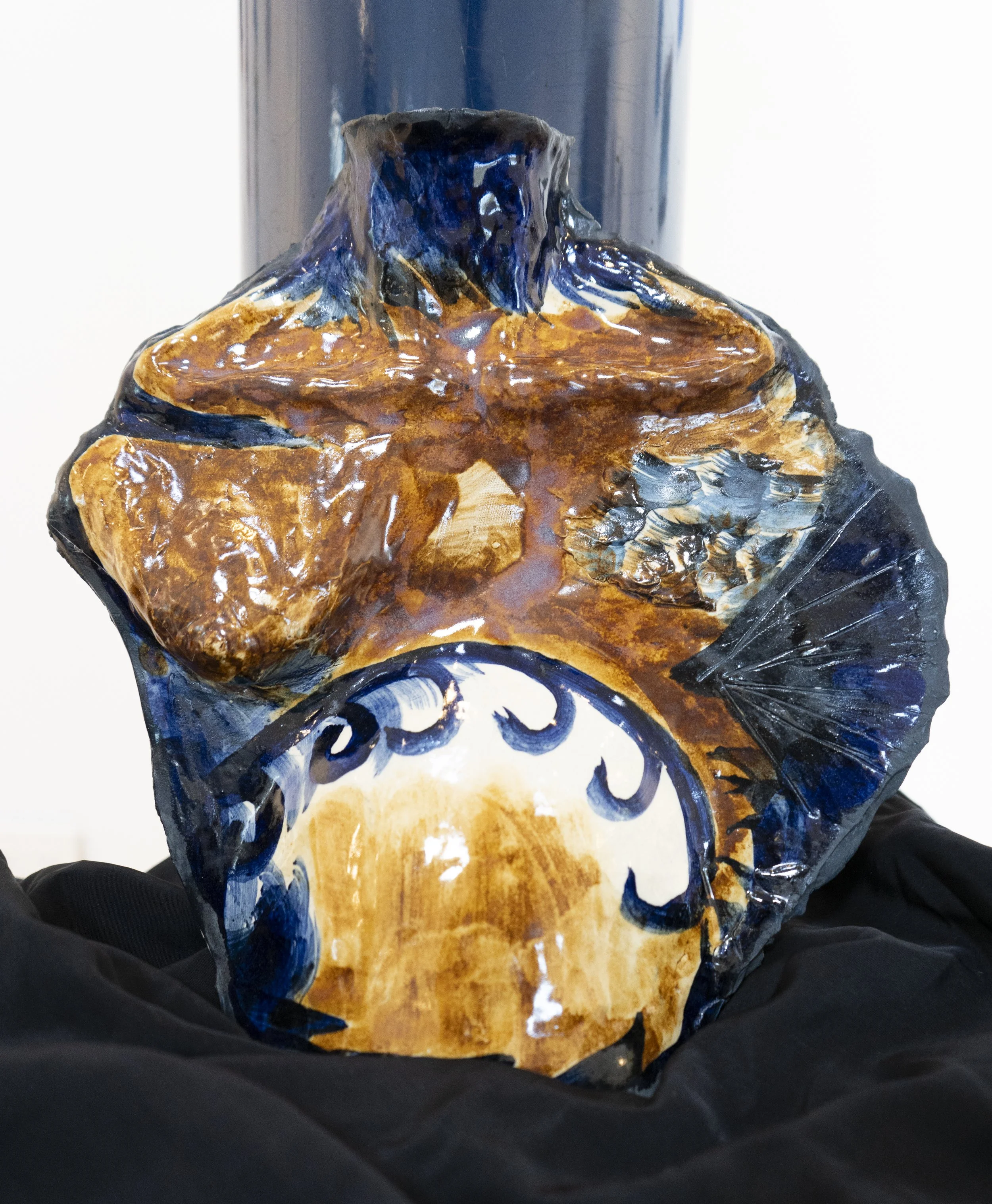 water birth, 2025. Kira Joy Williams. Hand built glazed ceramic, cobalt oxide, 13.5 x 2 x 13.5 in