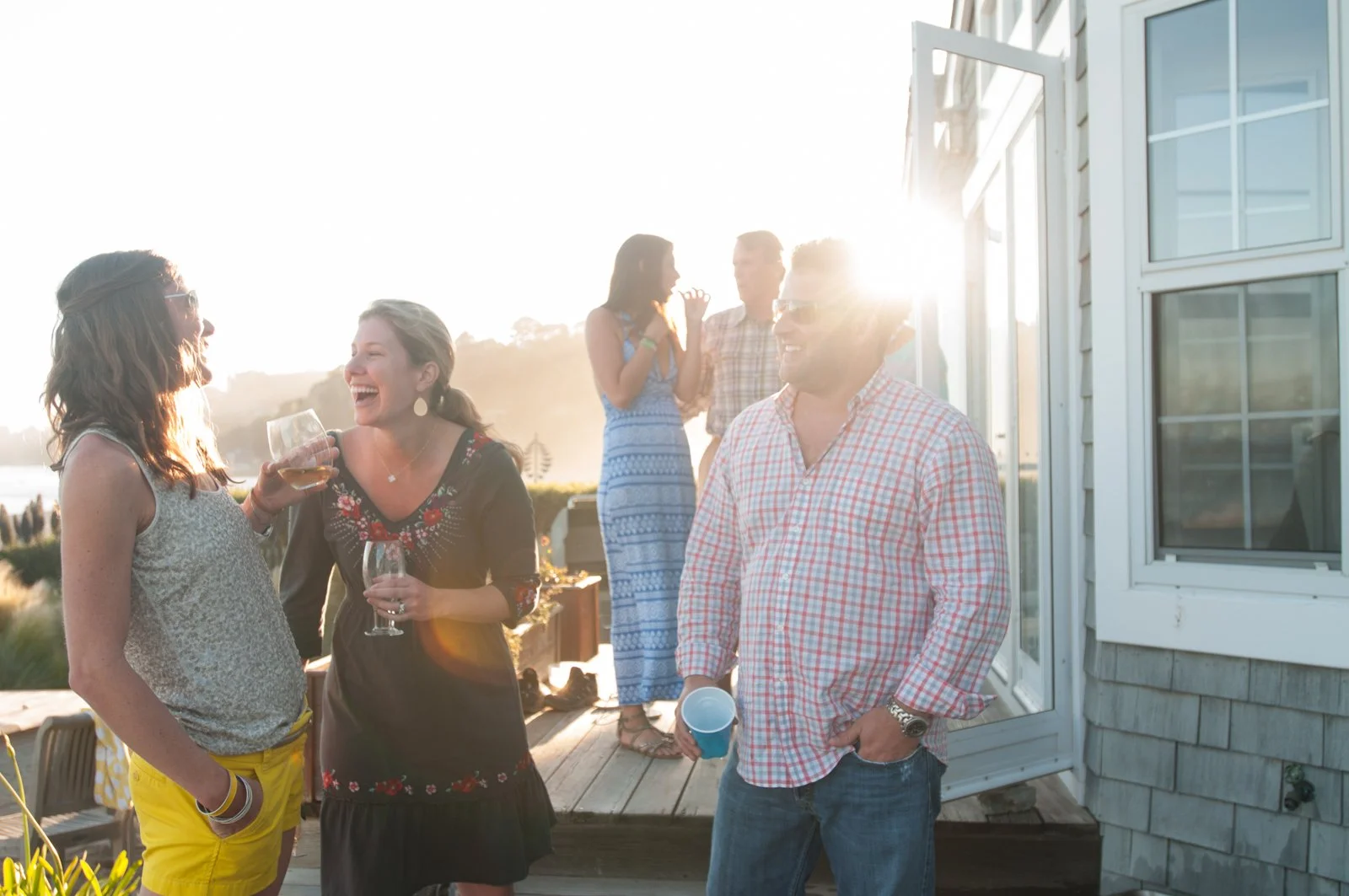031-guests-laughing-drinking-lifestyle-portrait-session.jpg