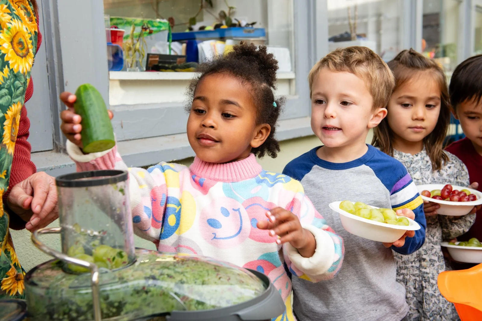007-child-putting-cucumber-preschool-photos.jpg