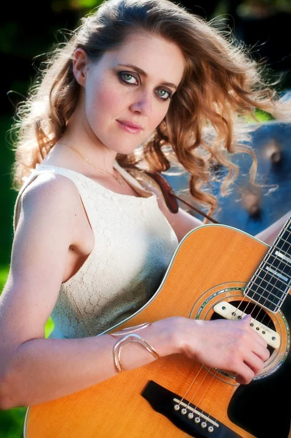 022-woman-playing-guitar-outdoor-fashion-photos.jpg