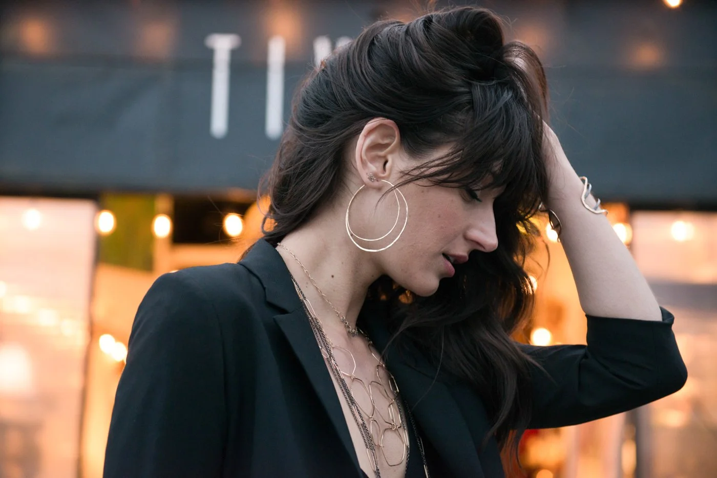 009-woman-posing-with-hand-in-hair-jewelry-photography.jpg