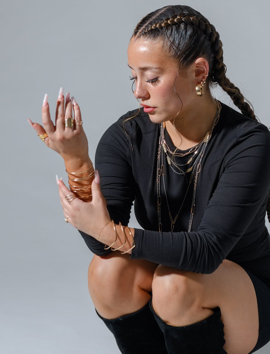003-woman-posing-with-braids-studio-fashion-photography.jpg